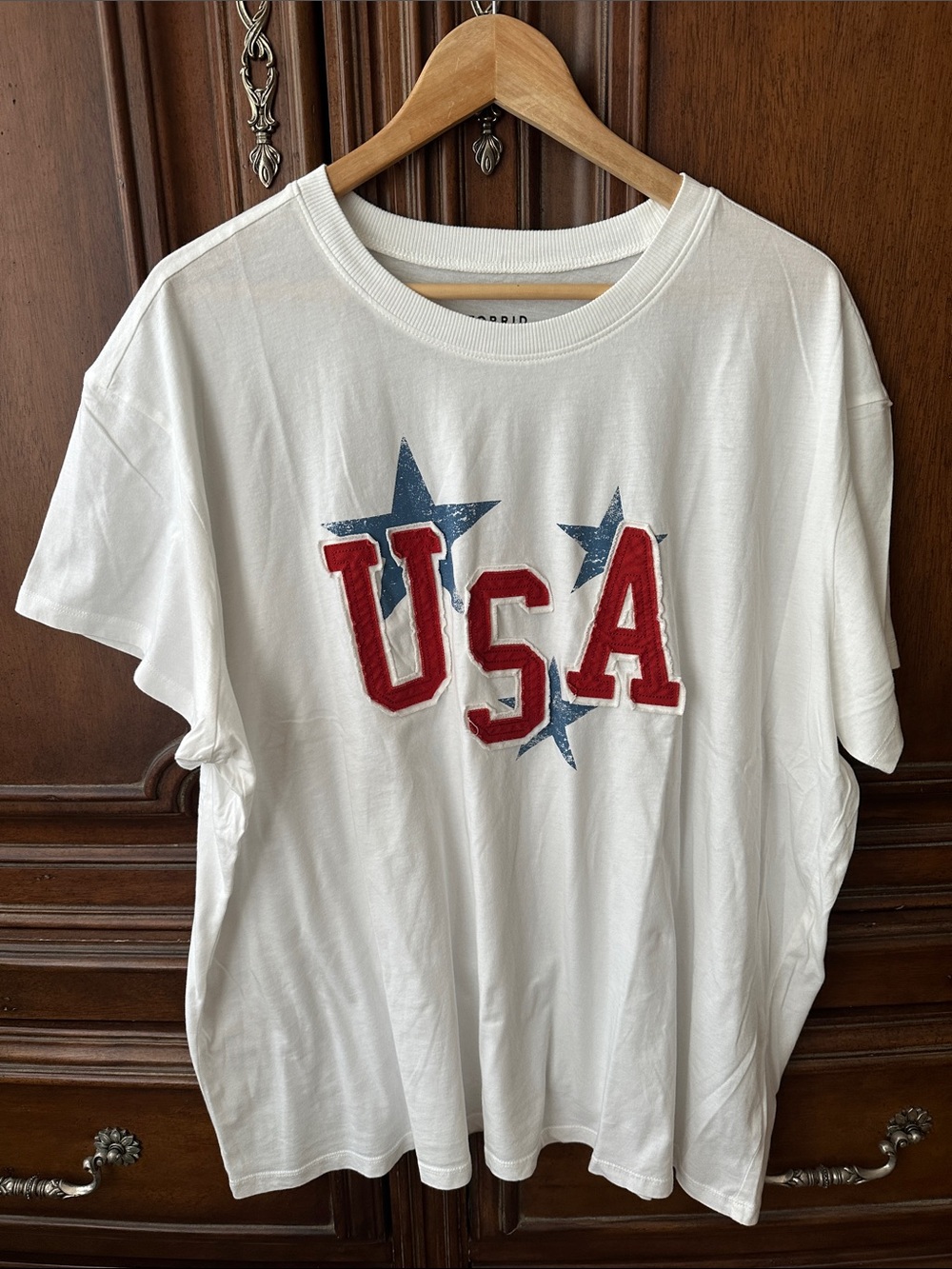 White USA Graphic Tee with Blue Stars and Red Letters